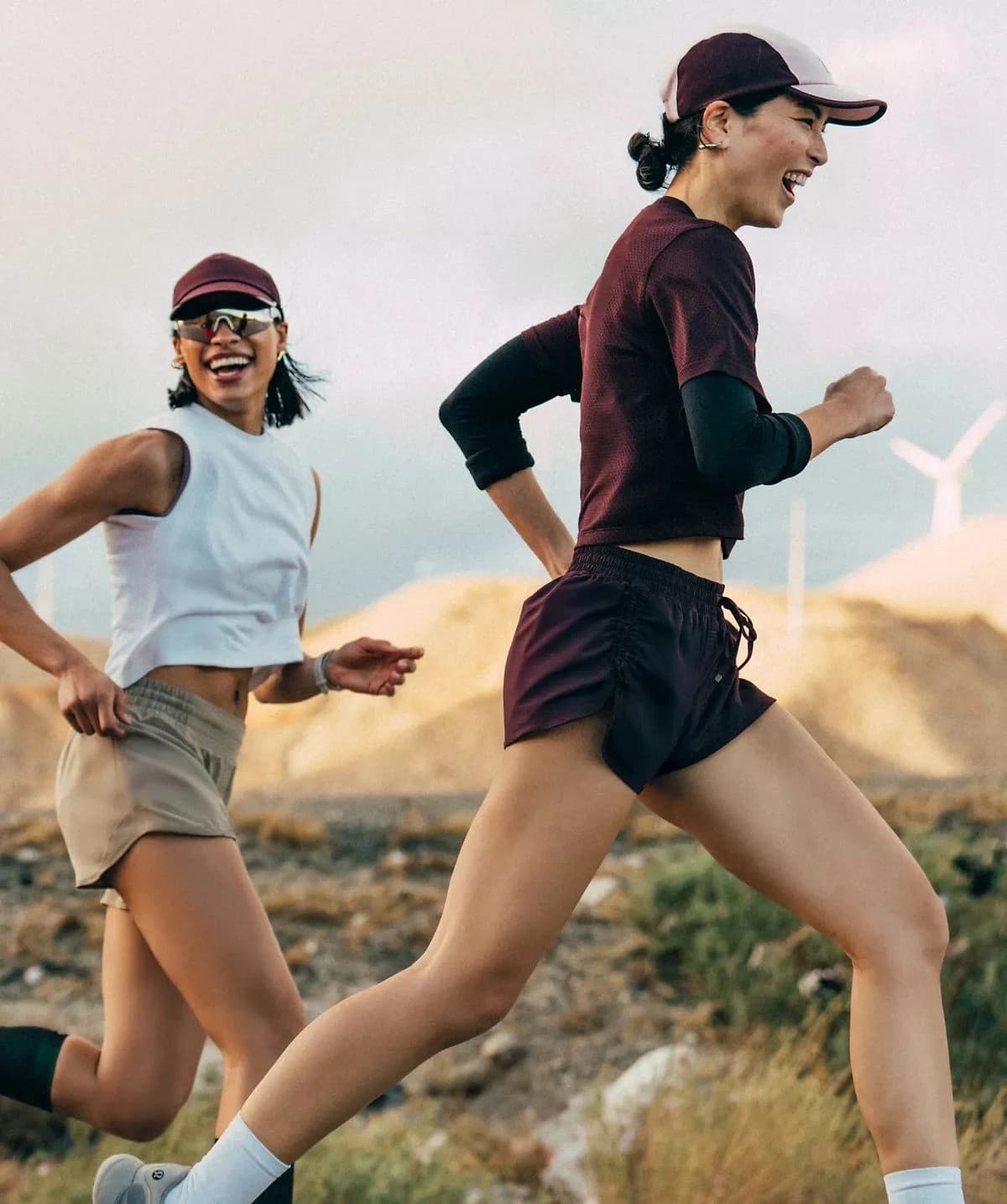 Two runners sharing a run on the trails